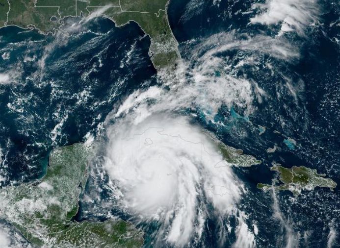 Satellite image of Hurricane Ian approaching Cuba with Florida and the state of Florida on September 26, 2022