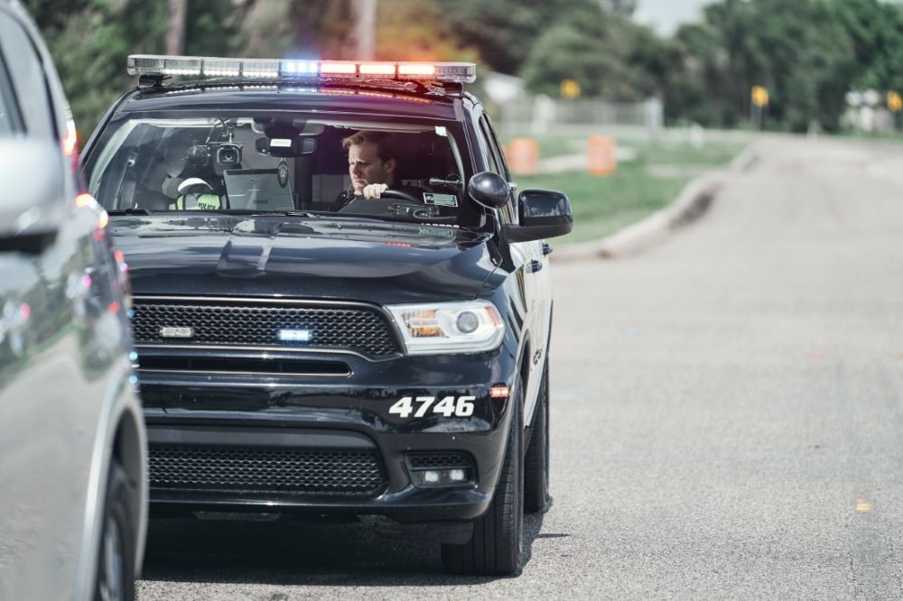 Patrol officer in car