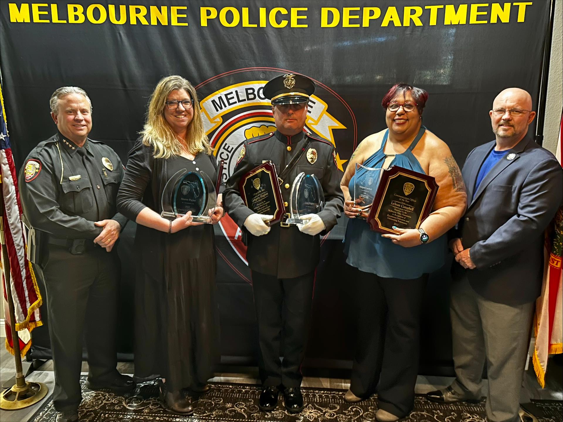 Group picture of MPD award winners with the Police Chief and Mayor.