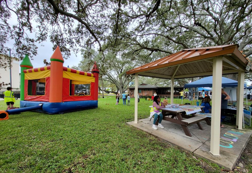 Bounce house and coloring station at Indian River Lagoon Day, Front Street Park.