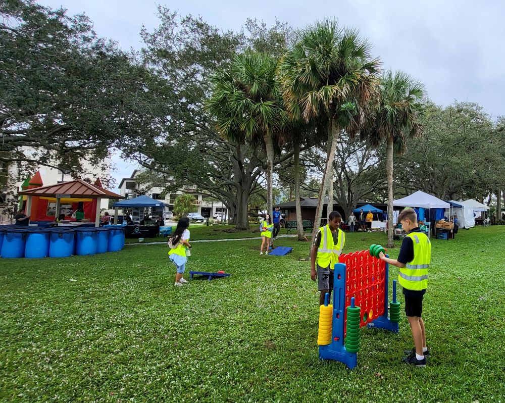 KKids playing games at Indian River Lagoon Day, Front Street Park.