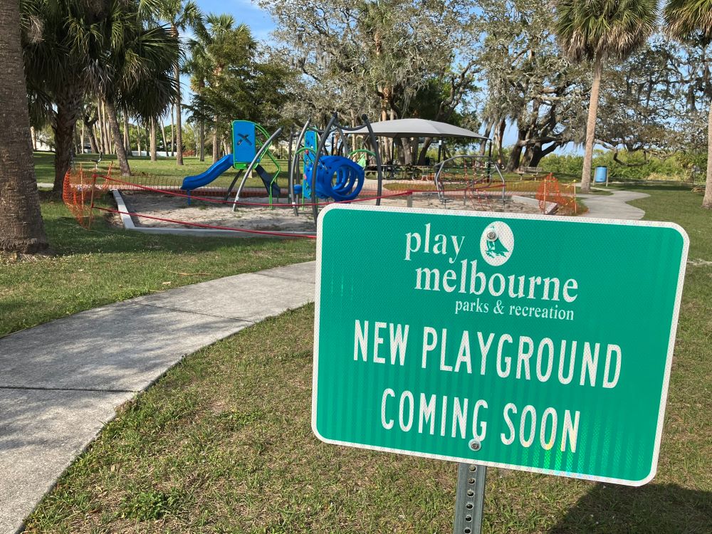 New playground coming soon sign at Riverview Park