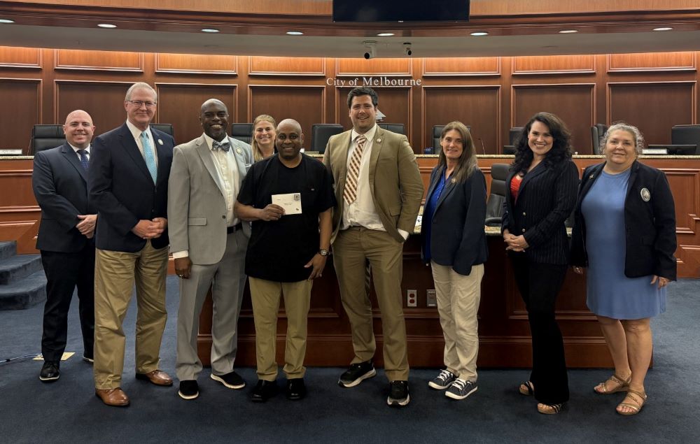 Council Members and employees during Service Awards presentation